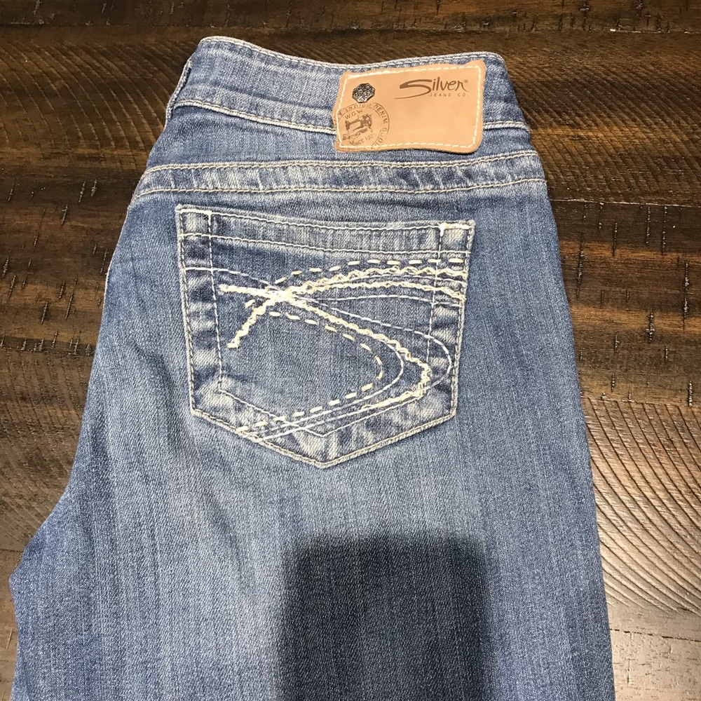 Silver jeans.